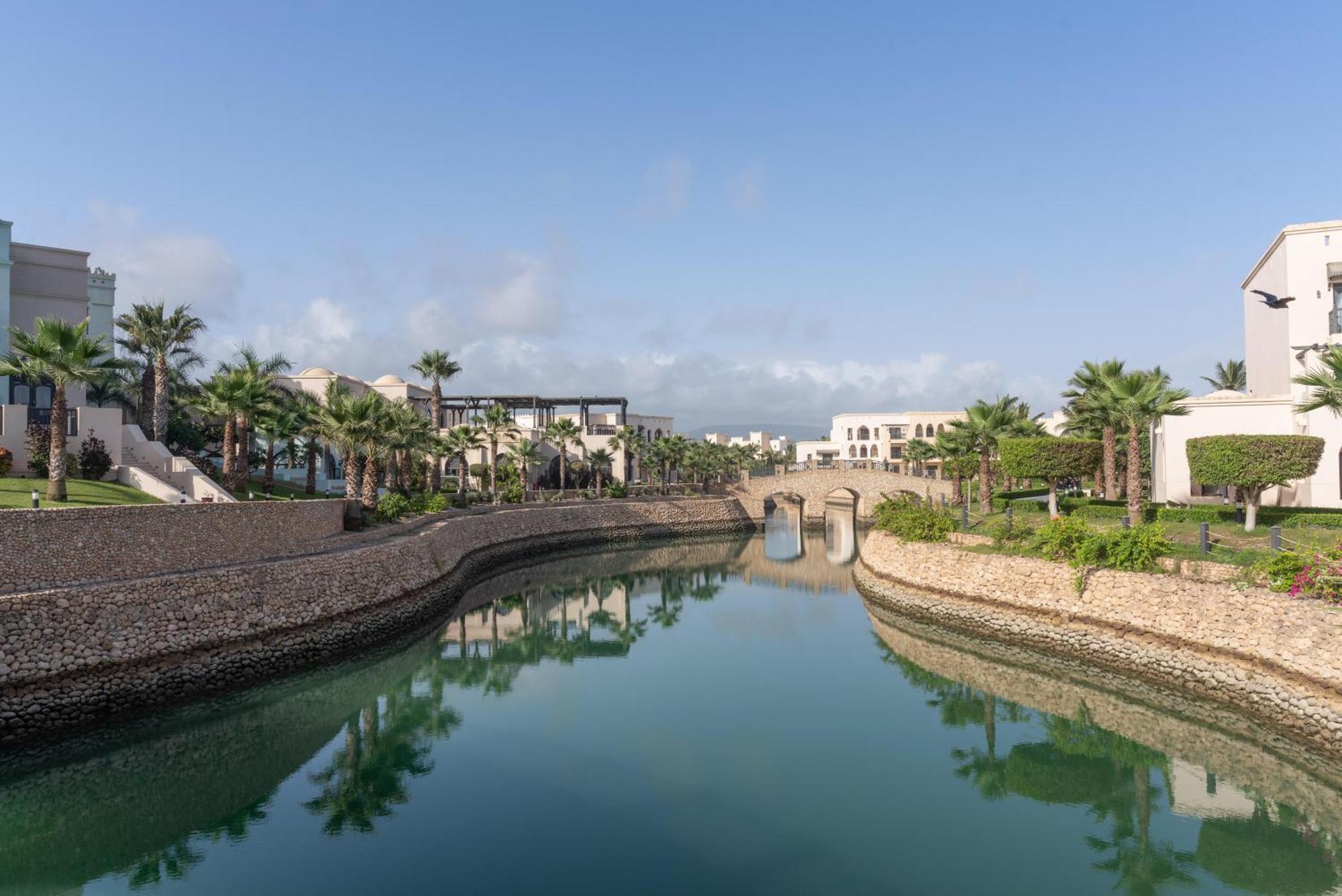 Salalah Rotana Resort Esterno foto Residential canal in Al Reef